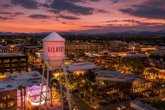 An Arizona water tower lit at dusk
